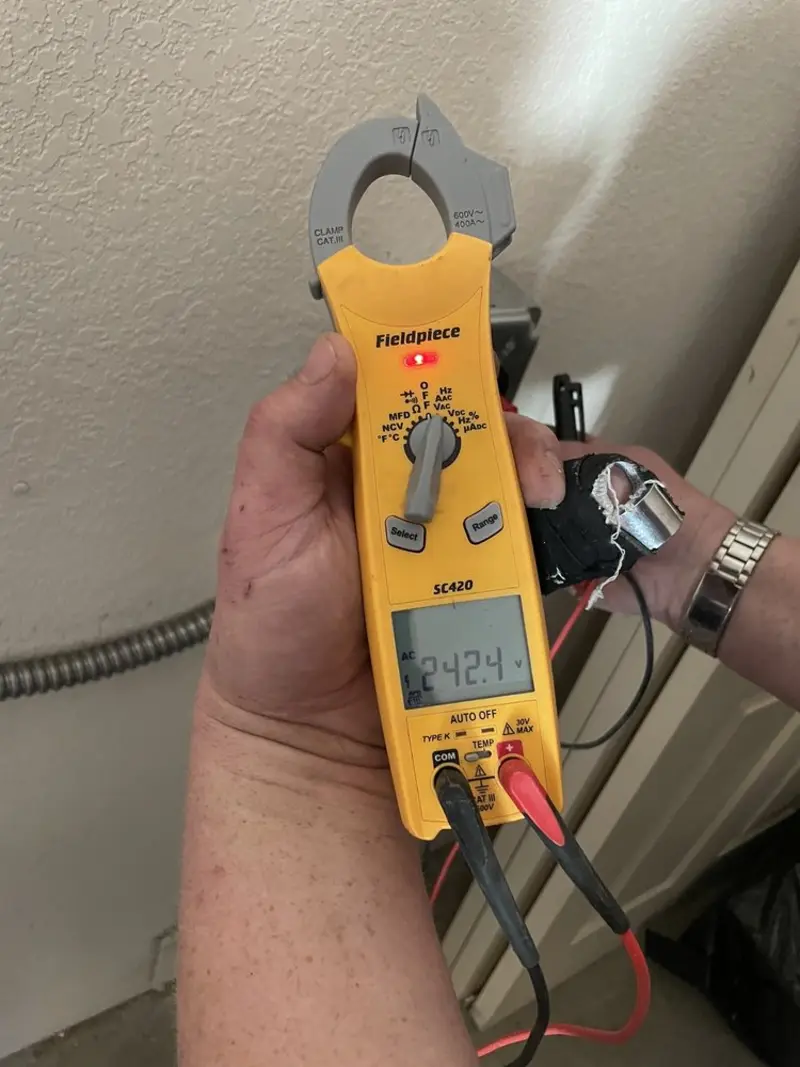 Voltage testing with clamp meter during Ceiling Fan Installation in Damascus